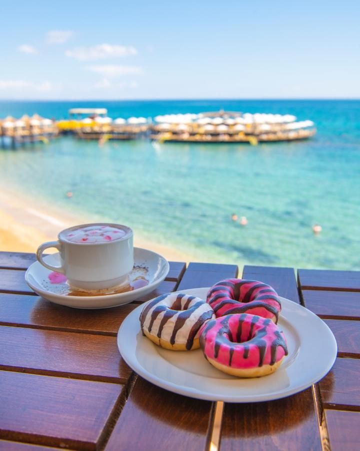 Salamis Bay Conti Resort Hotel & Casino Фамагуста Экстерьер фото A cup of coffee and donuts